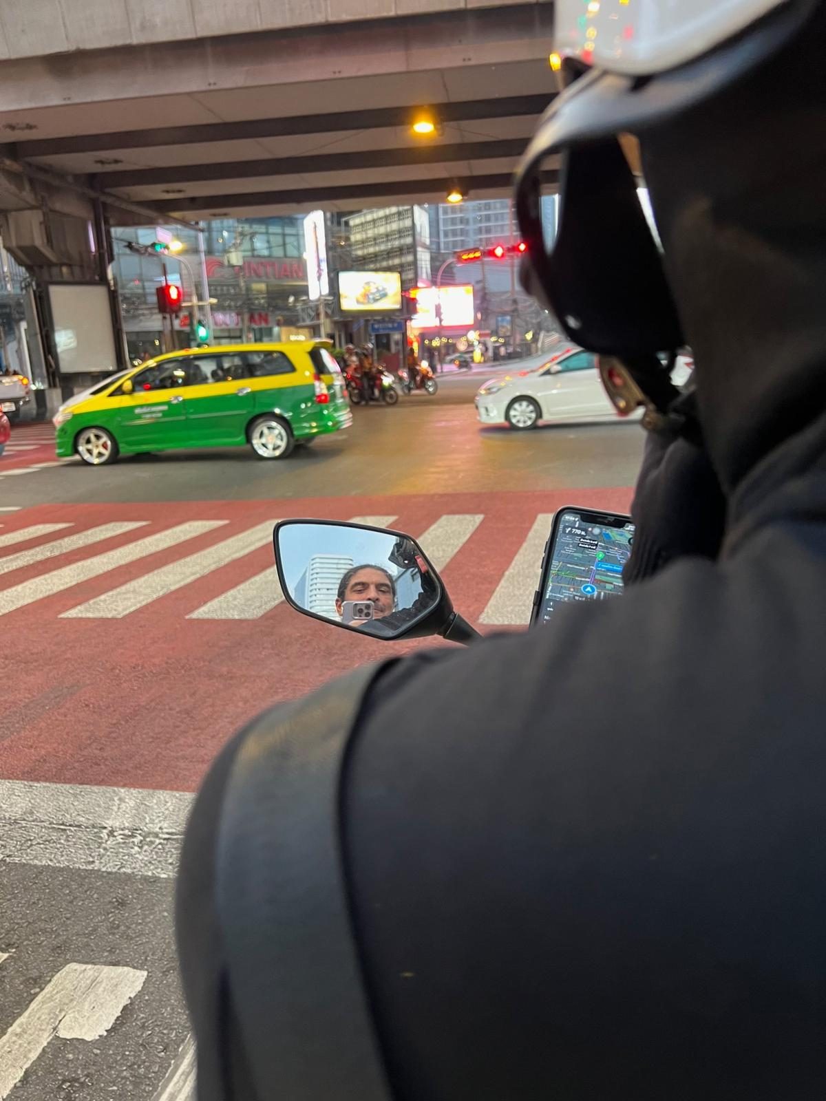 Motorcycle taxi in Bangkok during Devcon, 2023